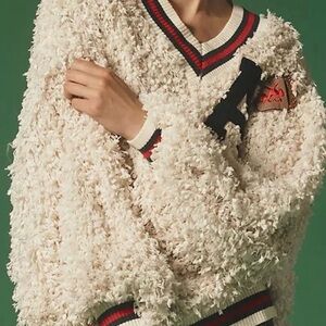 Eva Franco Cream V-Neck Sweater with Black and Red Accents